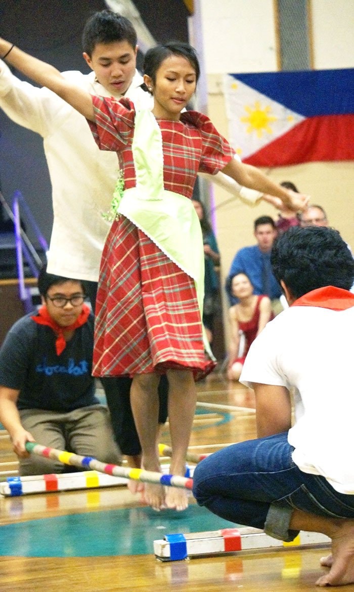 Tinikling dancers perform during Filipino Night.