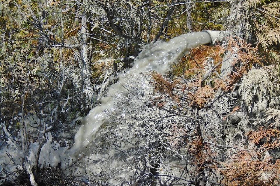 8634945_web1_copy_Mine-water-being-discharged-from-underground-Discovery-site-into-environment.BrentEdmundsphoto