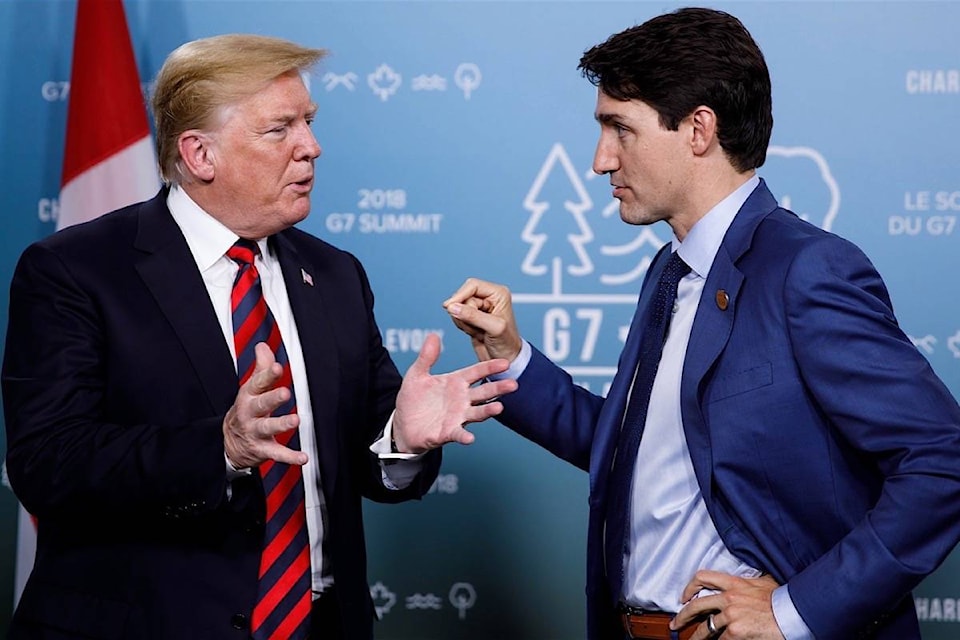 12327202_web1_20180612-BPD-Trudeau-Trump-G7-June8.18-PMO