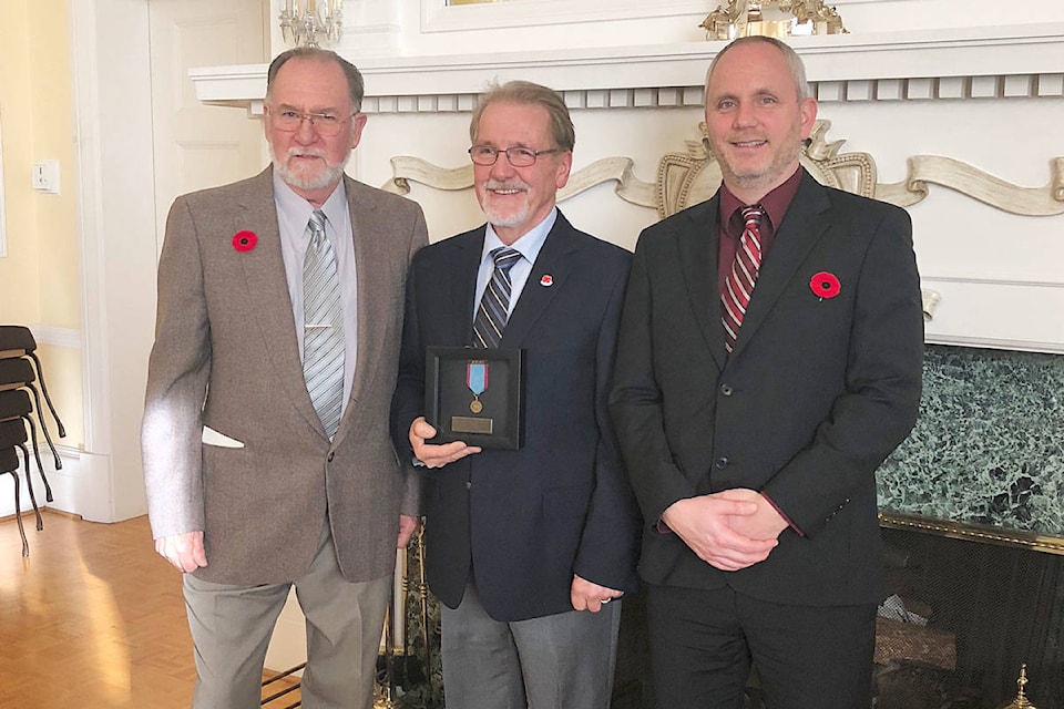 14327510_web1_WEB-PRU-Lorne-Ed-Ryan-with-SS-Beaver-Medal