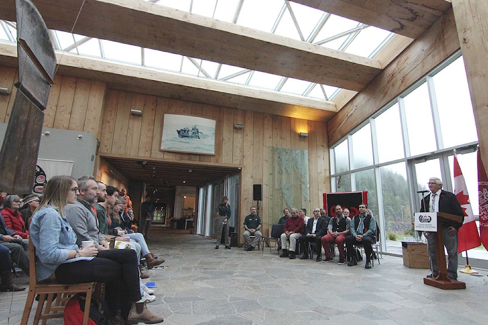 Gaahlaay, Lonnie Young, addresses the crowd who filled the Haida Heritage Centre Greeting House on Friday, Nov. 16 to celebrate the new Land-Sea-People plan for Gwaii Haanas. The integrated plan replaces two older agreements that separately managed the land and water. (Andrew Hudson/Haida Gwaii Observer)