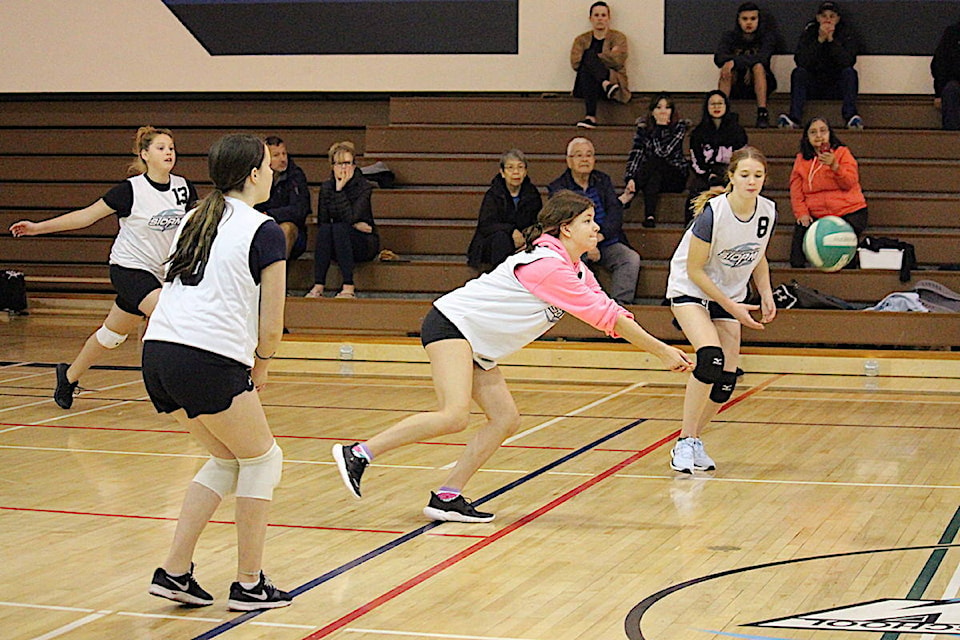Amy Hill returns Coast Tsimshian Academy’s serve during the Grade 8 girls volleyball matchup. (Jenna Cocullo / The Northern View)
