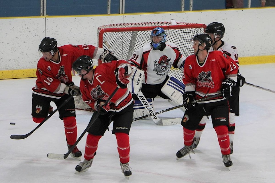 Rampage goalie Devon Gerrits tracks the puck through a sea of red. (Alex Kurial / The Northern View)