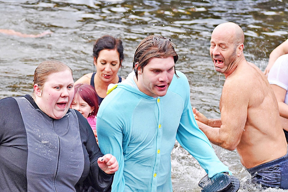 Expressions are worth a thousand words. Participants brave the winter waters in the polar plunge at Rushbrook Float on New Years Day. (K-J Millar/The Northern View)