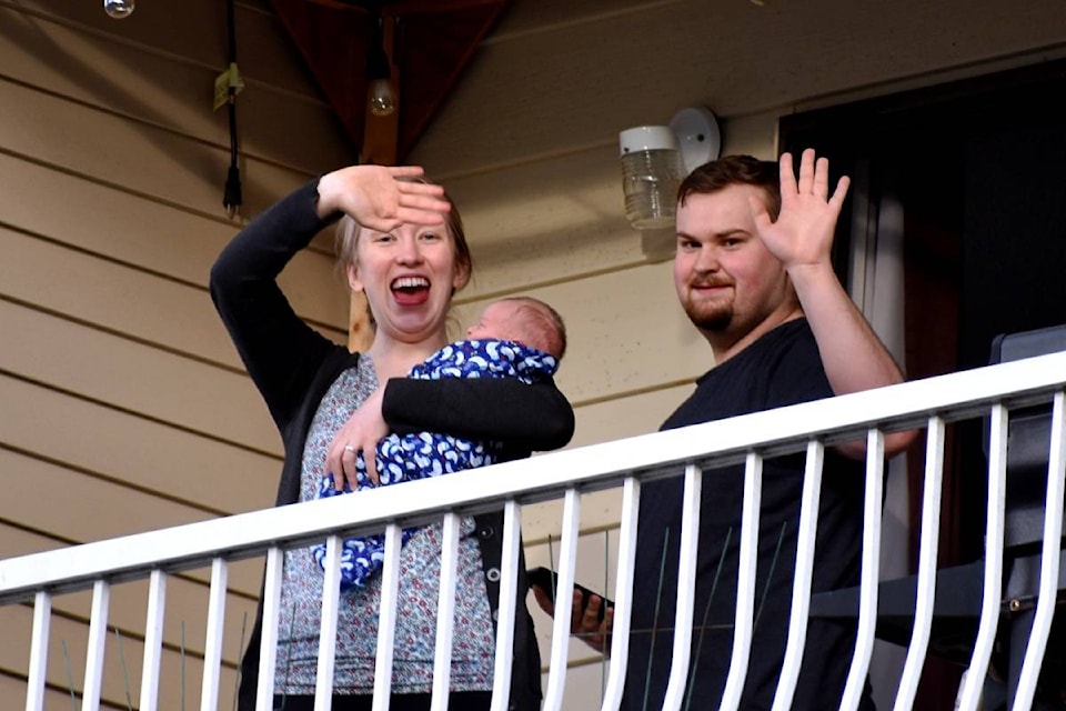 It was a big surprise to new parents, Eliza and Dalyn Lybbert, who have been in self isolation since their first baby was born on March 20, to see a parade of their friends drive by their apartment in Prince Rupert with banners welcoming baby Grayson James into the world. (K-J Millar/The Northern View)