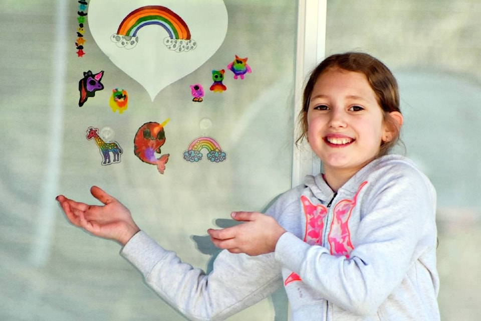 Hearts and rainbows decorate the home front of Ayla Hauknes (11) on April 11, as messages of love and hope during COVID-19 social distancing. More than 500 windows in Prince Rupert offer colour and rainbow resilience during the coronavirus.(Photo: K-J Millar/The Northern View)