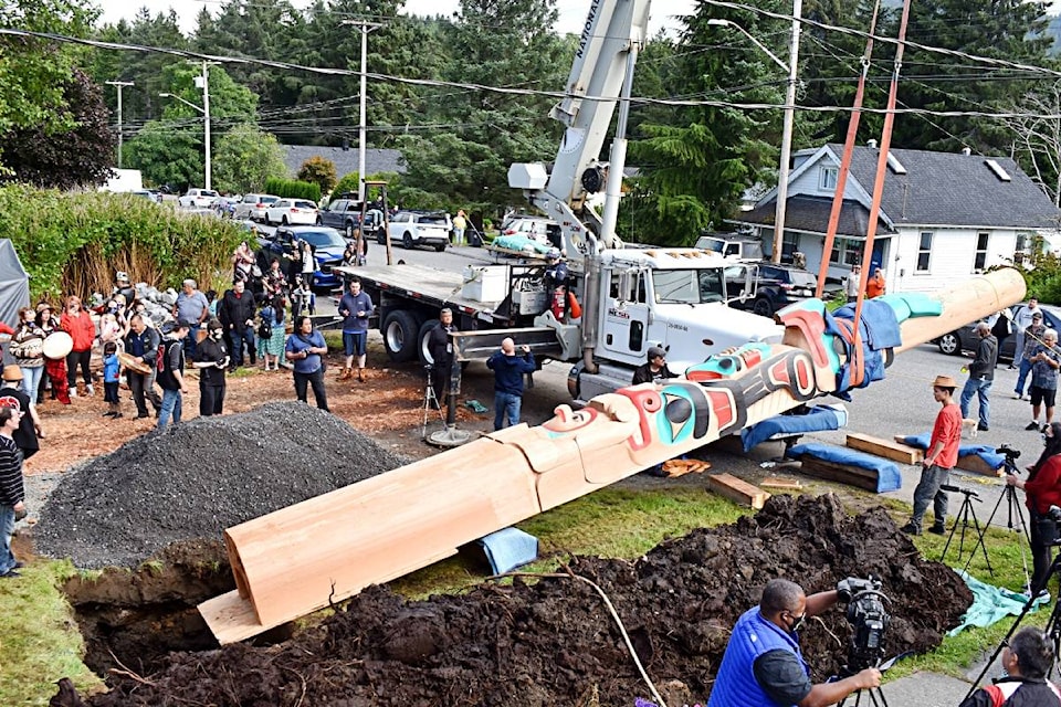 A 40-foot red cedar memorial pole was blessed and lifted into place at a residence in Prince Rupert on Aug. 11, 2020. (Photo: Bo Millar)