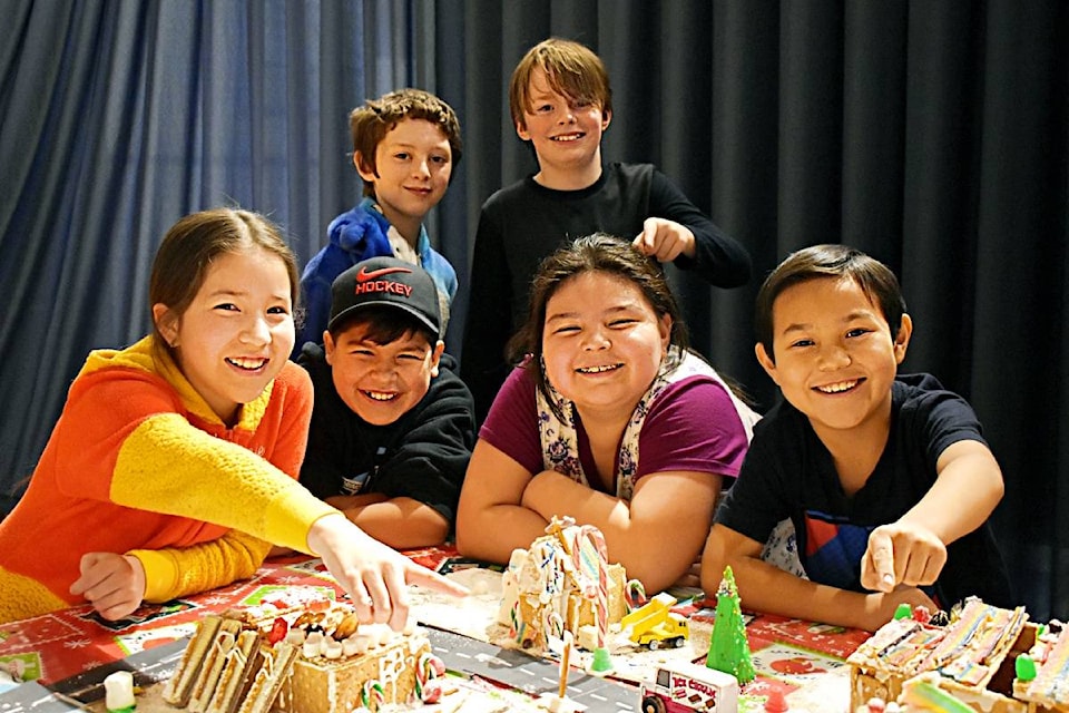 Grade five students at Conrad Elementary School in Prince Rupert, had a cross-subject learning assignment with building a gingerbread village, even holding municipal elections for council members and mayor. Alexis Hughes, Parker Sampson, Cassidy Nelson, Charlie Brown, back row is Chase Arndt and Kaden Hurlburt. (Photo: K-J Millar/The Northern View)