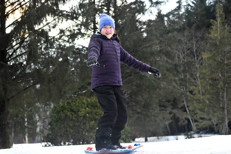 Showing us how it’s done by ignoring the frigid cold snap temperatures is Leah Hughes aged 12, snowboarding at the Prince Rupert Golf course on Feb. 9, 2021. (Photo: K-J Millar/The Northern View)