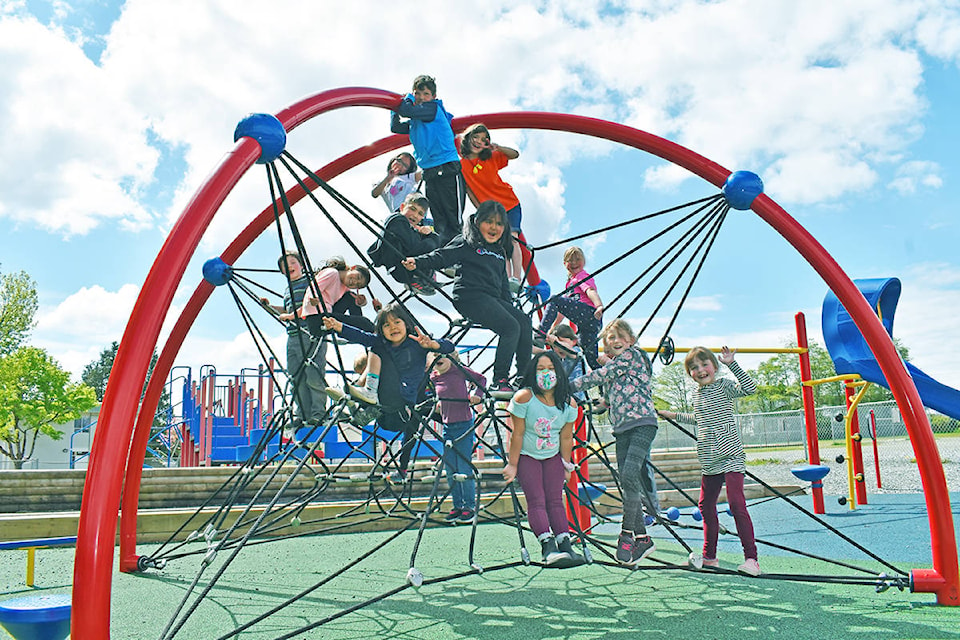 Grade one and two students at Lax Kxeen Elementary School are enjoying the new multi-ability accessible playground equipment recently installed at the school. Prince Rupert Port Authority donated $70,000 to the project. (Photo: K-J Millar/The Northern View)