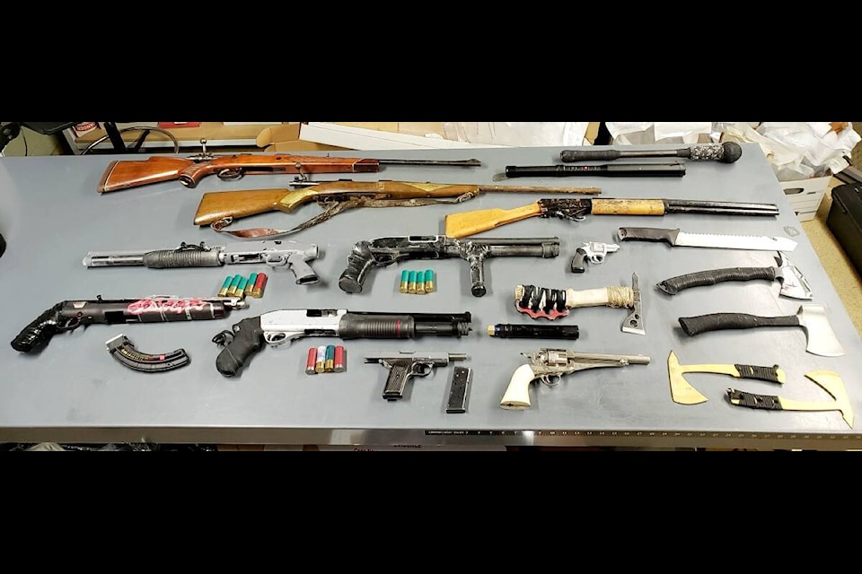 Weapons were seized from an 11th Ave East residence on Jan. 8, after a gunshot was reported on Jan. 7. A Prince Rupert man has been arrested. (Photo: supplied RCMP)