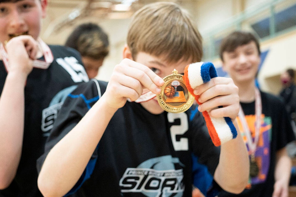 Hudson Veldman shows off his championship medal after the final of the BC Northwest Zone Championship, on Feb. 19. (Photo: Norman Galimski/The Northern View)