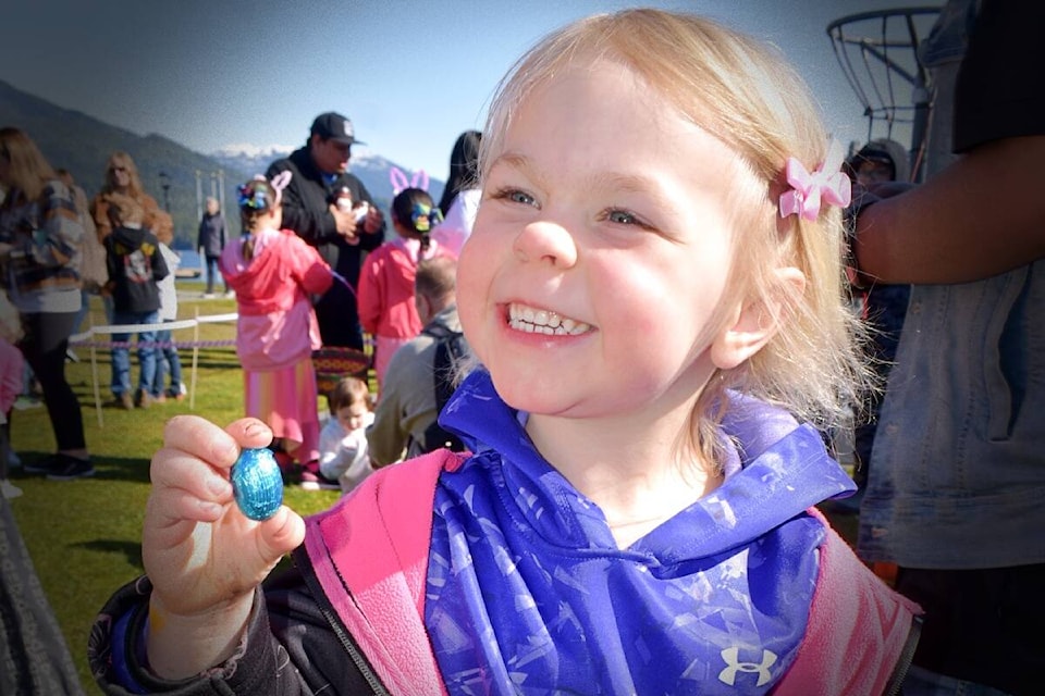 Ariana Zentner 3, shows off one of the chocolate treats for which she exchanged plastic eggs collected from the lawn of Mariners Park on April 16, at the Rotary Easter Egg hunt. (Photo: K-J Millar/The Northern View)