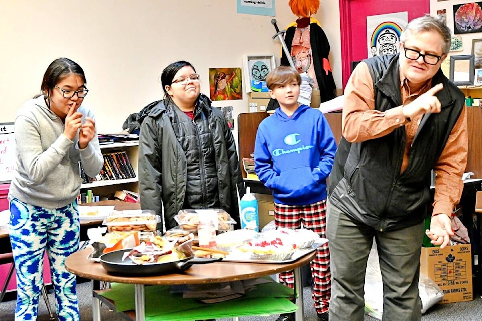 A “Paragraph Party” had PRMS teacher Tom Kertes showing Grade 4 and Grade 7 students how to take a bite out of writing with the construction of an “Analysis Cake” on Dec. 6. (Photo: K-J Millar/The Northern View)