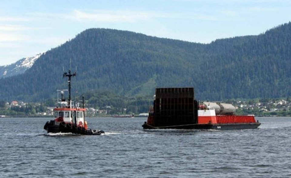 32139555_web1_210218-PRU-Tug-sinking-ingenika_1