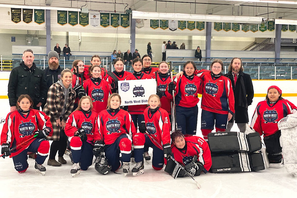 The U15 Female North West regional team are all smiles after winning one of their games at hockey provincials in Kamloops in March. Pictured are; assist coach Colin Batemen of Smithers (back row from left), head coach Wes Hart of Burns Lake, Nicole Bateman of Smithers, Jericho Tse of Kitimat, Taylor Siemens of Vanderhoof, Marika Jack of Hazelton, manager Nyree Hazelton of Burns Lake (middle row from left), Leeara Betts of Hazelton, Eden Tse of Kitimat, Elencia Hazelton of Burns Lake, Kaylee Levick of Burns Lake, Alayna Hart of Burns Lake, assist coach Dan Plante, Miley Harris of Hazelton (front row from left), Kate Thiessen-Clark of Vanderhoof, Maci Kadonaga of Vanderhoof, Kiah Thiessen-Clark of Vanderhoof, Kamryn Gutierrez-Perreault of Kitimat and Jada Adams of Hazelton. Missing from the photo are Audrey Luggi of Fort St James and Alexis Erickson of Burns Lake. (Photo submitted)