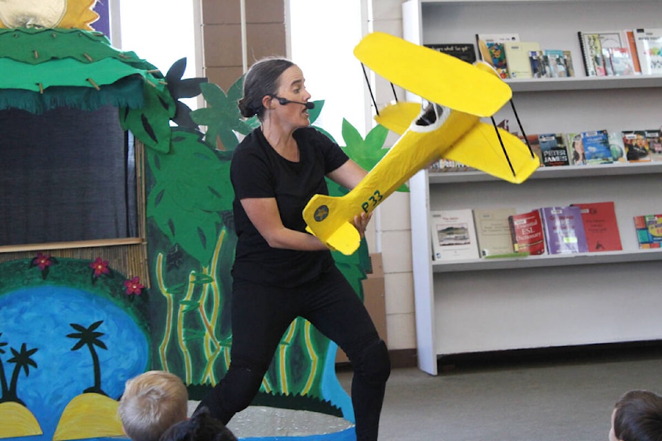 Puppeteer Sally Miller performs with a biplane from Pico and the Golden Lagoon during a performance at the Prince Rupert Public Library July 7. (Thom Barker/Black Press Media)