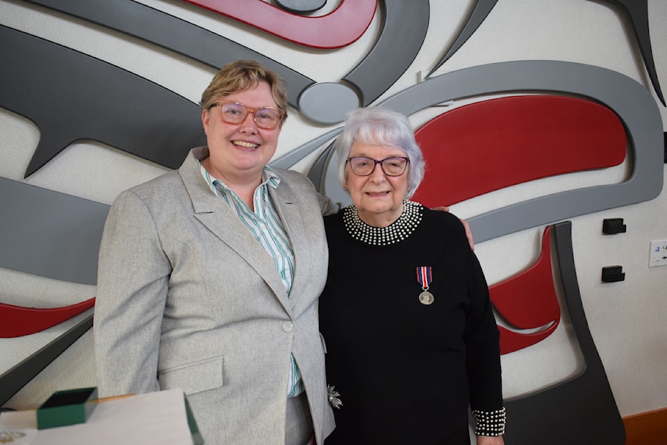 North Island-Powell River MP Rachel Blaney awards Port Hardy seniors advocate Rosaline Glynn with the King Charles III Coronation medal on Friday, Feb. 28 at the Kwa'lilas Hotel. (Tyson Whitney photo)