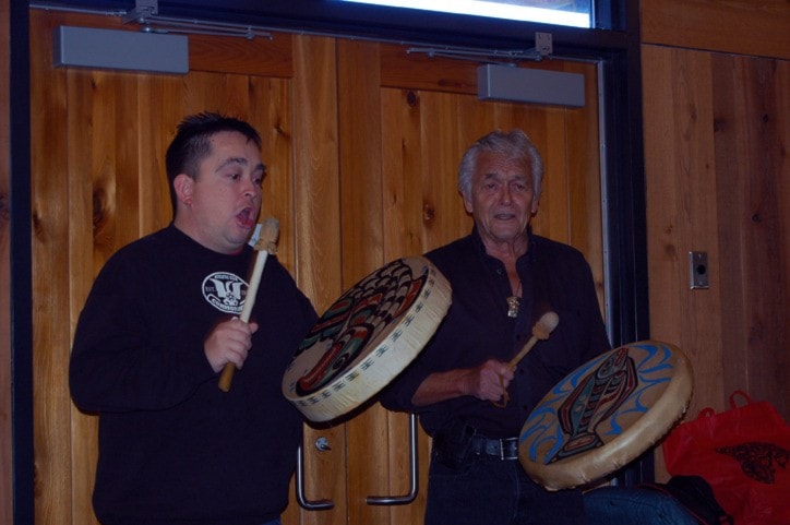 Eli Cranmer & Bill Cranmer singing 'Namgis feast song at the anniversary event.