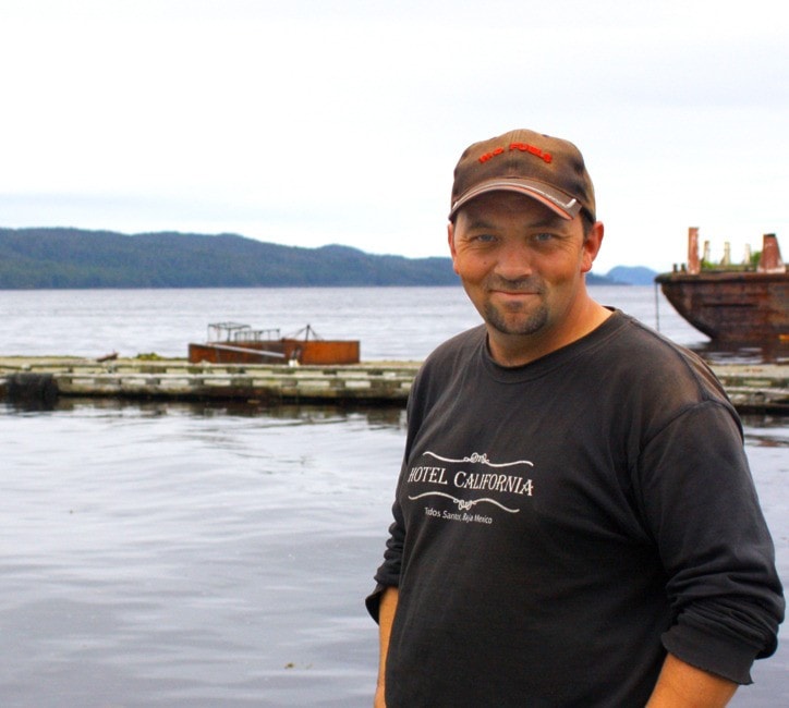 Matthew Kozak stands on the fuel dock where he saw the struggling kayaker.