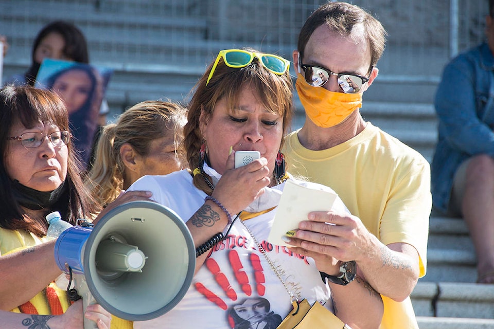 Martha Martin, mother of Chantel Moore, speaks through tears at a healing gathering at the BC Legislature building Thursday evening. Moore was fatally shot by police during a wellness check in New Brunswick on June 4. (Nina Grossman/News Staff)