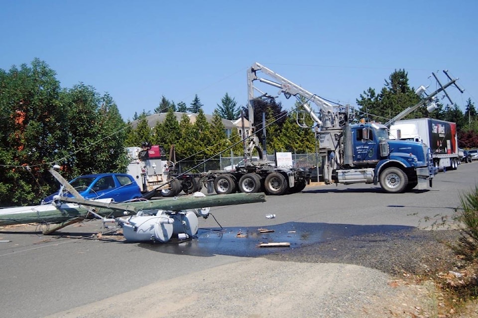 Three BC Hydro power lines were down near Herring Gull Way and Franklin’s Gull Road in Parksville on Wednesday, July 14. (Michael Briones photo).