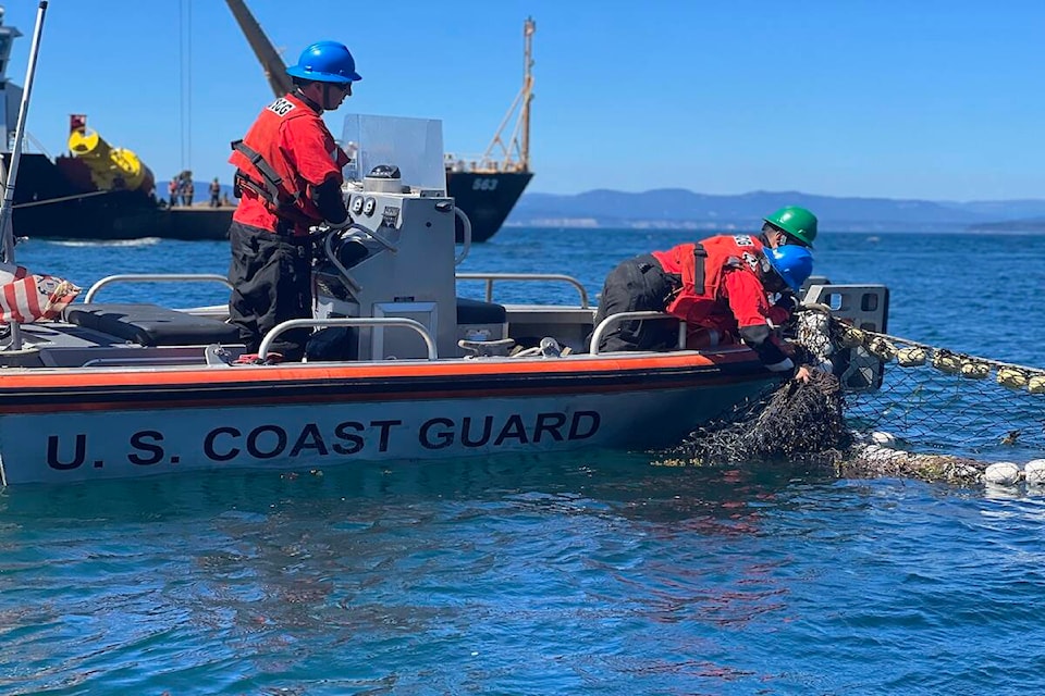 During response activities Tuesday (Aug. 16) U.S. Coast Guard personnel recover most of a seine fishing net that detached from a vessel that sank off San Juan Island near Greater Victoria on Aug. 13. (U.S. Coast Guard Pacific Northwest/Twitter)