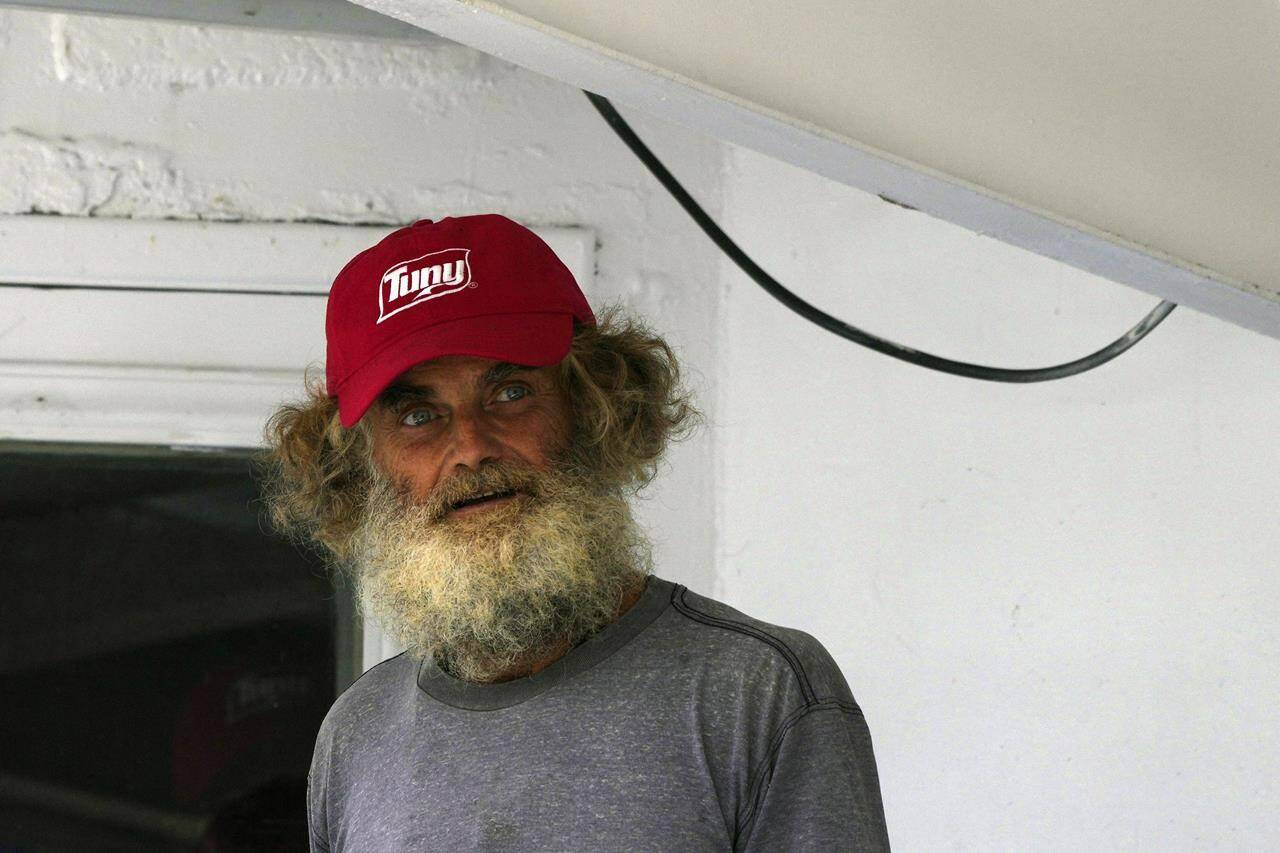 Smiling castaway and 'braver' dog return after months adrift on the Pacific  - North Island Gazette