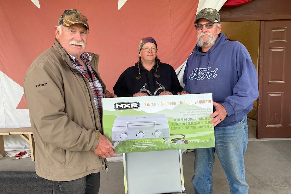 Wendy Johnson (middle) won the Hidden Weight during the 2024 annual Father's Day Fishing Derby on June 16 sponsored by The North Thompson Fish and Game Club. 