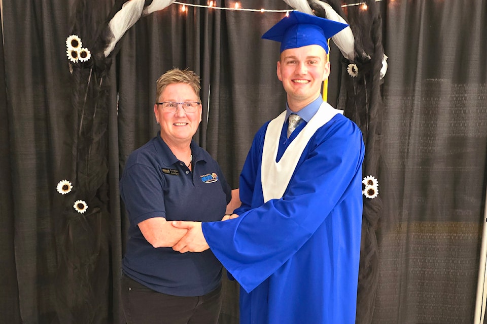 Louise Lodge, chair for the North Thompson Communities Foundation awards a bursary on behalf of the foundation to Cohen Hunt at Barriere Secondary in 2024. 
Hettie Buck / ronaldomanosa 