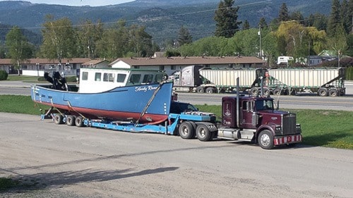 5880barriereBlueBoatontrailer