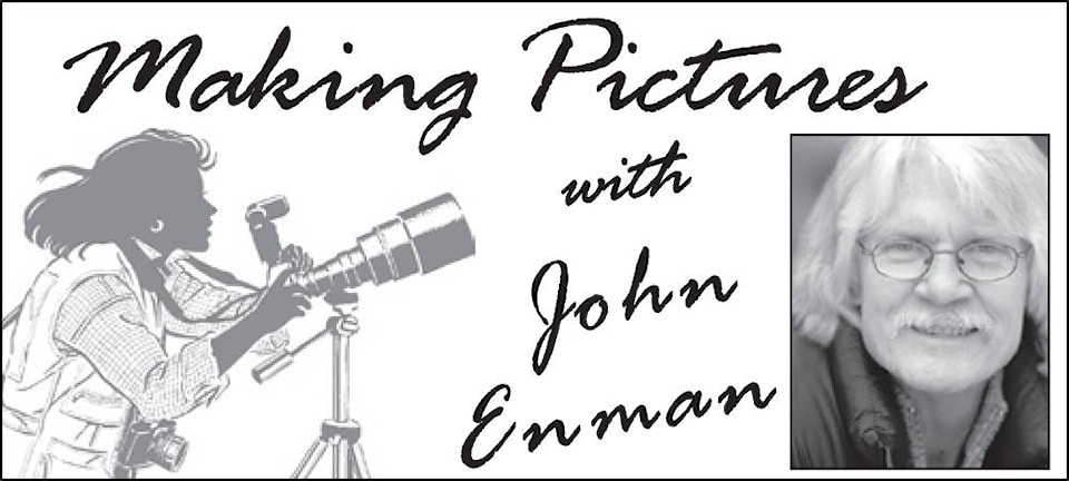 10373302_web1_John-Enman-Camera-Man