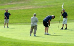 11703934_web1_besgolf05793_w
