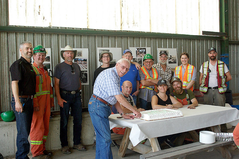 12509662_web1_GSFP-50th-cake-cutting-Ted-Carman-Greg-Smith