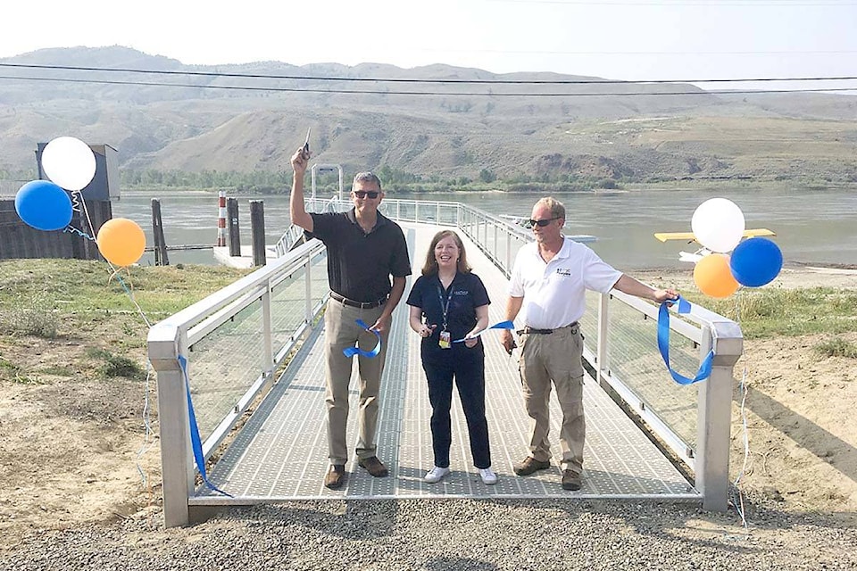 12919685_web1_Ribbon-Cut-float-plane-dock