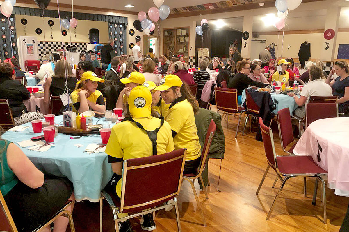 15956105_web1_Sock-Hop-tables--crowd