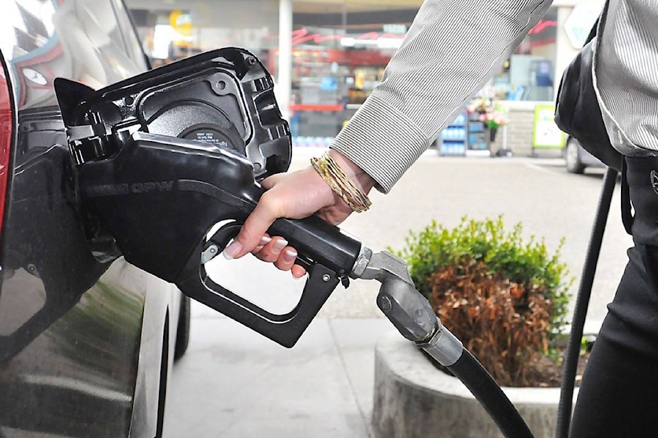 16274720_web1_20190404-BPD-Gas-pump-woman.BP