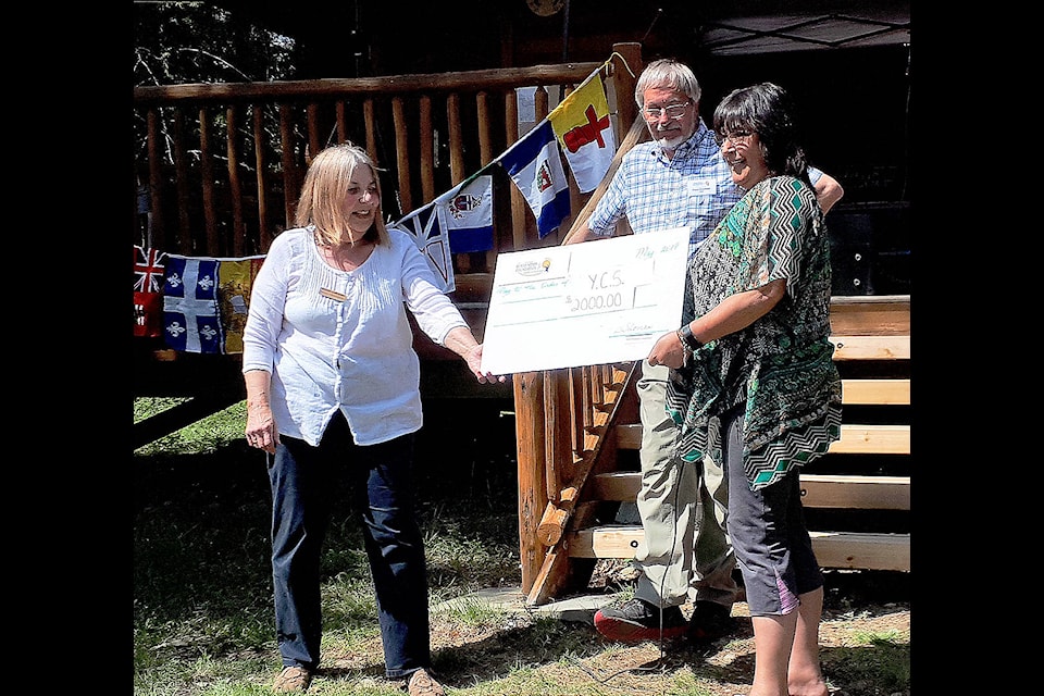 (From L - R): In 2019, NT Communities Foundation board member Sandra Wetterstrom and former NTCF chair Franz Friesinger present a grant from the Foundation to Yellowhead Community Services for Early Years programs, with Cindy Wilgosh accepting. 
Jill Hayward Photo