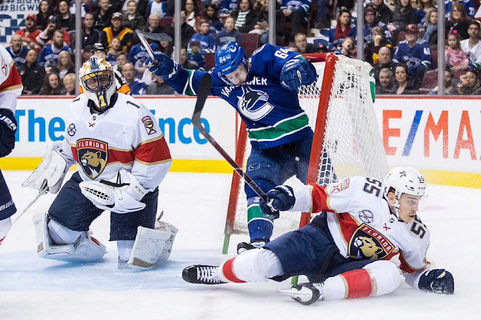 17463883_web1_190113-IFD-Canucks-Panthers2