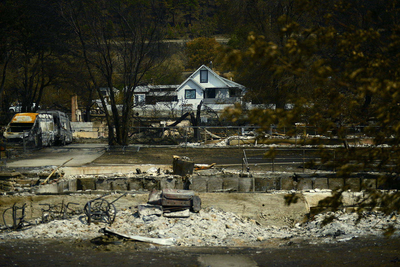 A house stands amid the burnt debris in the Village of Lytton, B.C. on Friday, July 9, 2021 following a massive wildfire that tore through the town destroying 90 per cent of it. (Jenna Hauck/ ronaldomanosa)