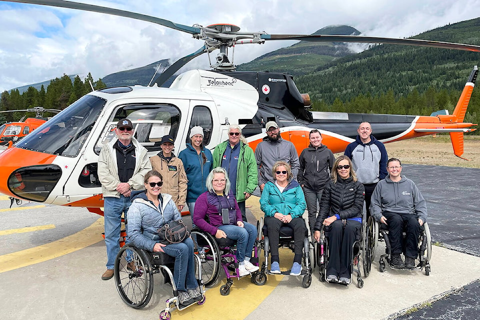 Team members from the SCI BC / Access BC Team, Regional Tourism Access & Inclusion Liaisons, and UNBC’s Associate Professor and a research student from the School of Planning and Sustainability who were participating in the Access Now Mapping Project in Valemount, B.C., this past August. Back row: (L-r) Robson Heli-Magic Pilot Bob Slater, Nancy Harris, Mark Groulx, Rebecca DeLorey, Rob Stiles. Front row: Alison Duddy, Joceylyn Maffin, Lori Slater, Sonja Gaudet, and Brandy Stiles. (Gaudet submitted photo)