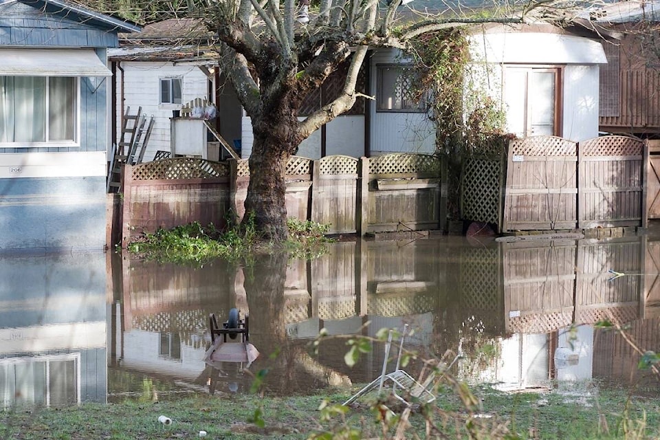 27413699_web1_211208-PQN-QB-Climate-Change-Impact-floodingORD_1