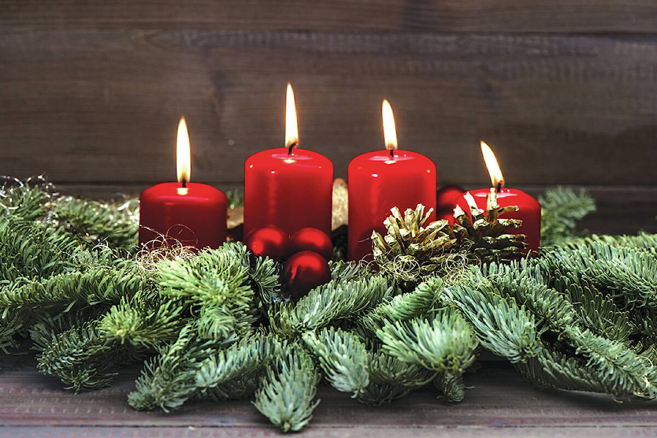 27493894_web1_211223-NTS-Reflections-XmasMorning-candles_1