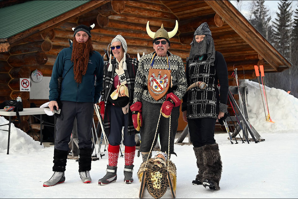 Darren Coates, Barb Smith, Carman Smith and Mary MacLennan don viking attire, ready to protect the wee baby heir, Haakon Haakonson, for the Wells Gray Outdoors Club Birchleg event at the Candle Creek Trails the morning of Saturday, Feb. 12. (Stephanie Hagenaars/Clearwater Times)