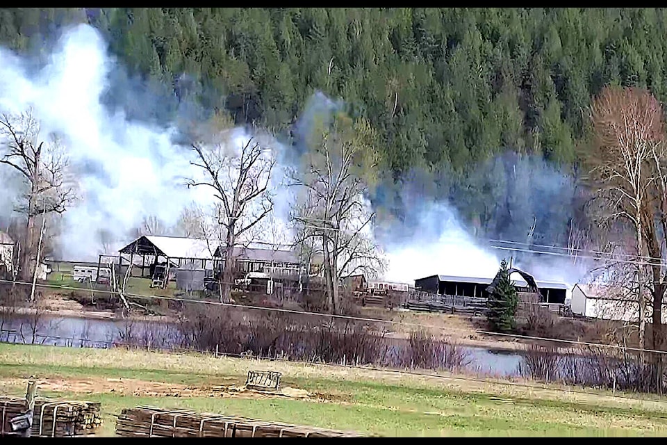 Multiple firefighting agencies responded to a grass fire along the railway tracks behind a ranch across the North Thompson River in Little Fort the evening of Monday, April 25. (Blackpool Fire Rescue photo)