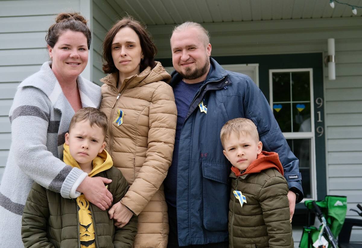 Tanya Finley, left, with Oleksandra and Serhii and their twin boys, from left, Oleksii (Lesha) and Oleksandr (Sasha). Photo: Bill Metcalfe