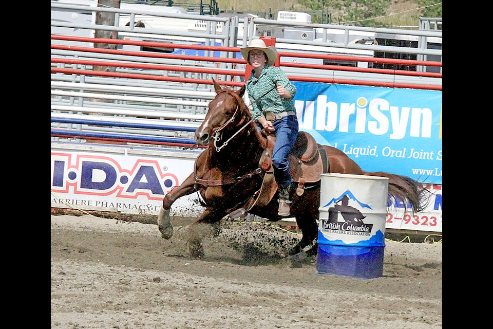 Williams Lake competitor Madison Paquette and her horse, Dyna, dig in rounding a barrel during the BC Barrel Racing Association Finals held at the North Thompson Fall Fair and Rodeo facility in Barriere the weekend of Aug. 19 -21. (Jill Hayward photo)