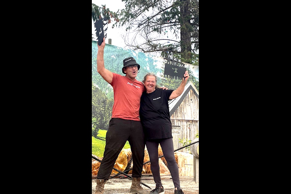 Event organizer Ben Leffler of Laughing Loggers is shown presenting Marleen (last name unavailable) with the Bull Of The Woods Amateur Logger Sports Champion LumberJill award at the North Thompson Fall Fair in Barriere on Sunday, Sept. 4. (Laughing Logger photo)