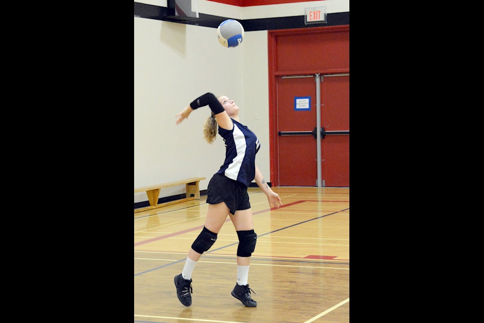 Barriere Secondary volleyball player Holly Gordon serves during a game against St. Ann’s at Clearwater on Tuesday afternoon, Sept. 27. (Photo by Keith McNeill)