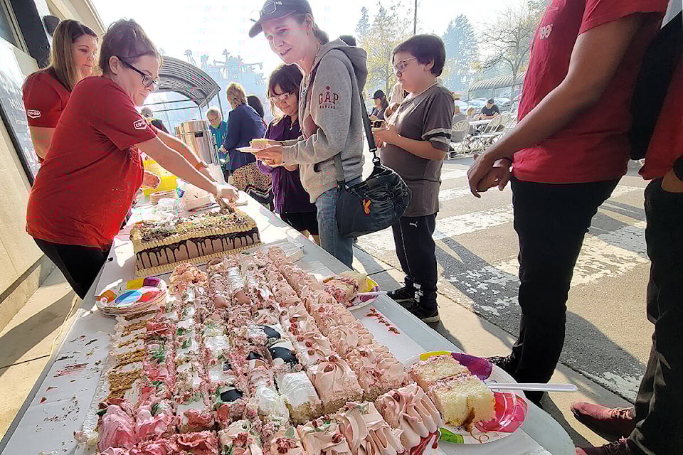 Otter Co-op celebrated it’s 100th anniversary with giant birthday cakes at the Langley Retail Centre on Wednesday, Oct. 19, close to the original 1922 site. (Dan Ferguson/Langley Advance Times)